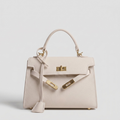Borsa Luise Tessora in pelle con manici corti e tasche laterali, stile elegante e pratico, vista frontale.