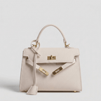 Borsa Tessora Luise in tessuto con manici in pelle, stile elegante e moderno, vista frontale con dettagli visibili.
