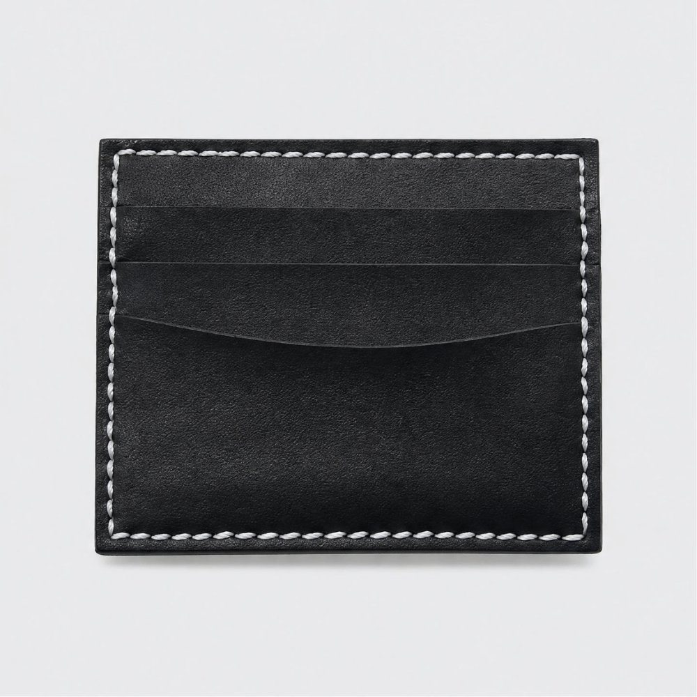 Porta carte Tessora in pelle con scomparto per carte di credito, design compatto e elegante, visualizzato in primo piano.