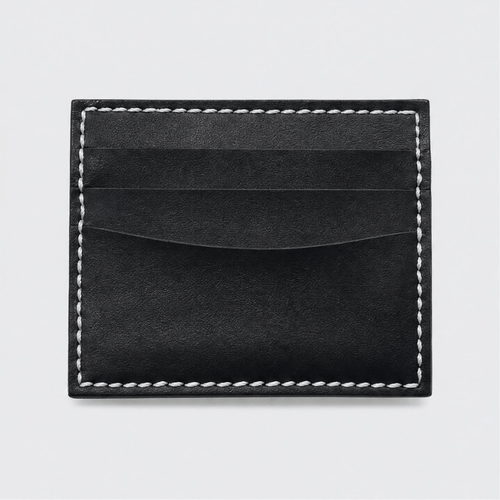 Porta carte Tessora in pelle con scomparto per carte di credito, design compatto e elegante, visualizzato in primo piano.