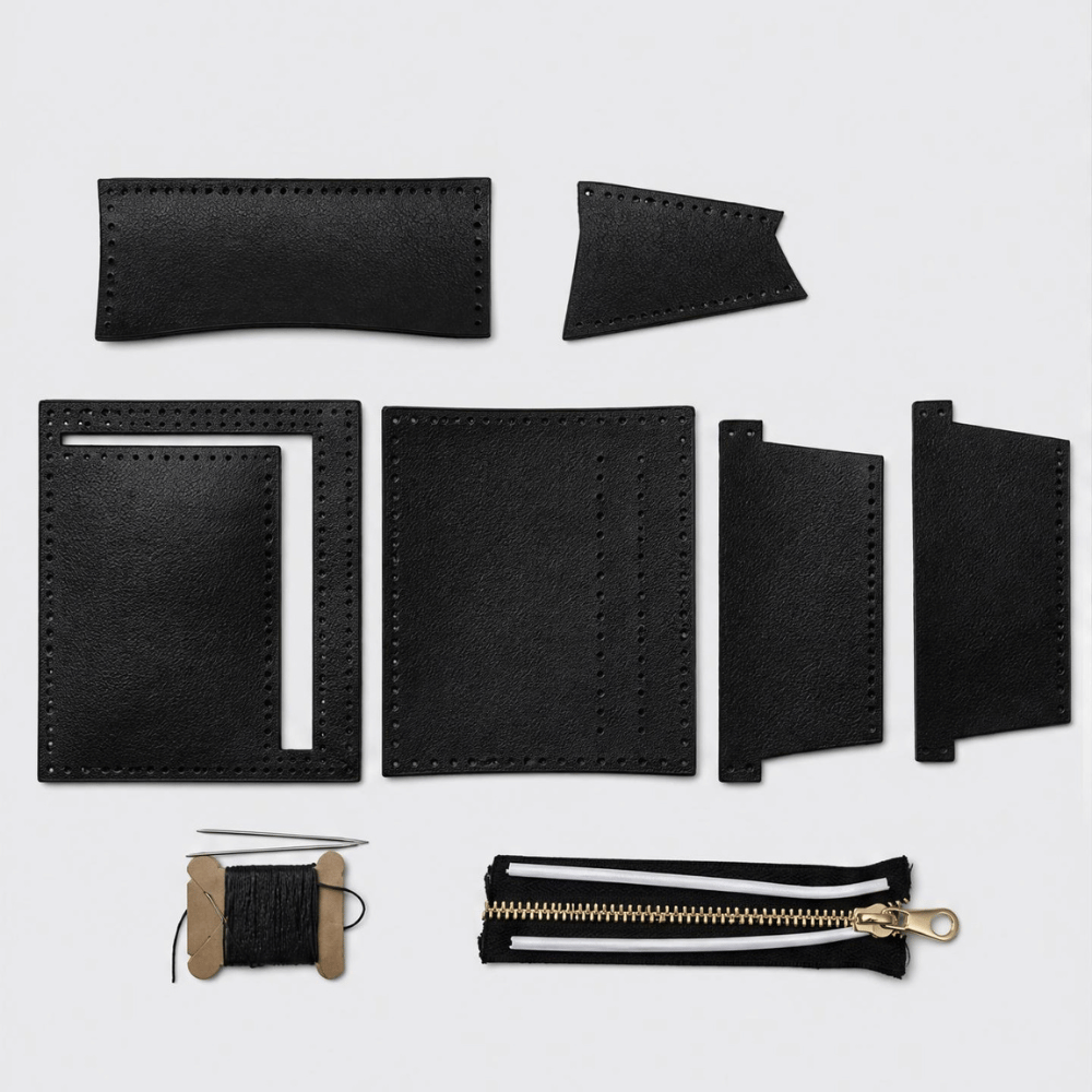 Kit porta carte Tessora con design elegante, composto da tessuti resistenti e spazio per carte di credito e documenti.
