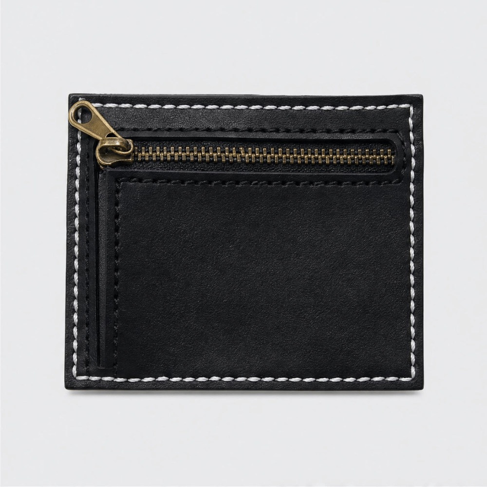 Porta carte Tessora, elegante e compatto, con scomparti in pelle per carte di credito e documenti, in colore nero.