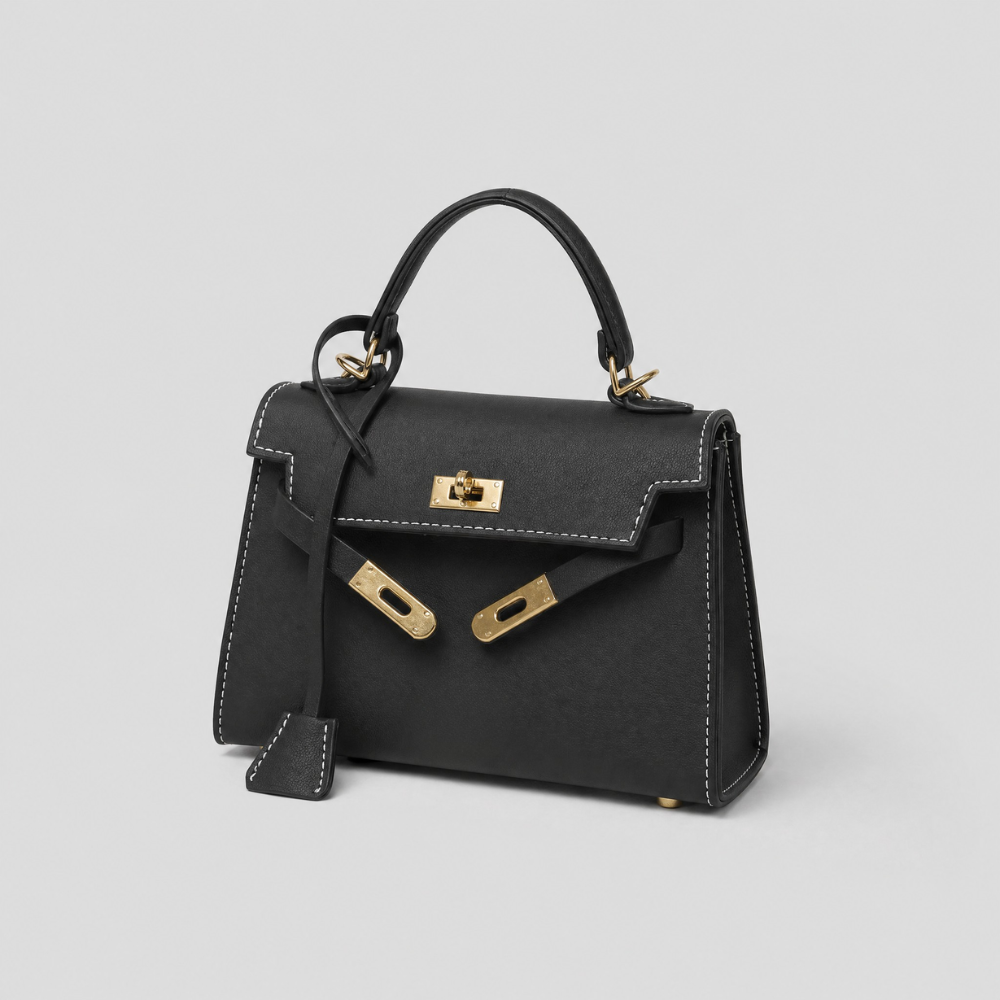 Borsa Luise Tessora in pelle con manici corti e dettagli eleganti, vista frontale su sfondo neutro.